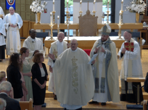 Fr. William Gilmore passes the peace 2
